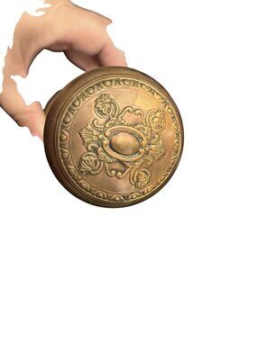 Antique Brass Door Knob Set With Ornate Design And Connecting Spindle